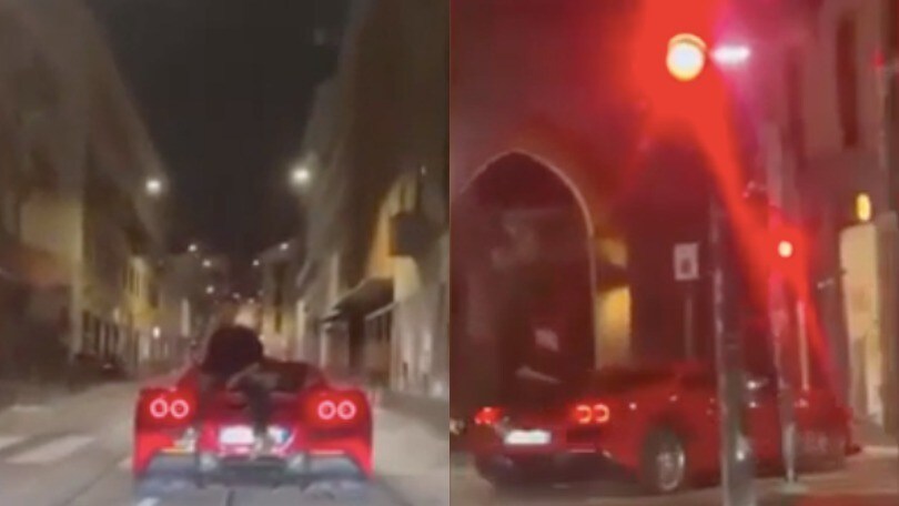 Follia in Ferrari a Milano: parla al telefono mentre è seduto sul cofano