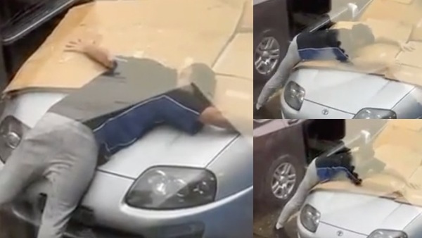 Un uomo e la sua Toyota: la protegge col corpo dalla grandine VIDEO